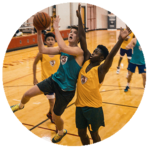 kids playing in a basketball tournament